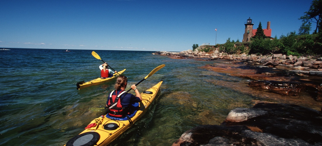 Kayaking the Apostle Islands - Discover Wisconsin's beautiful cities, towns and beautiful landscapes.  Wisconsin is for adventure!  From its lush forests and rolling hills to magnificent beaches - Wisconsin is a Vacation and Adventure Destination you will enjoy.  See America - See Wisconsin -a USA Travel Guide Destination!