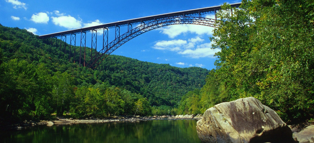 New River Gorge Bridge - Discover West Virginia's beautiful cities, towns and beautiful landscapes.  West Virginia is for adventure!  From its lush forests and rolling hills to magnificent beaches - West Virginia is a Vacation and Adventure Destination you will enjoy.  See America - See West Virginia -a USA Travel Guide Destination!