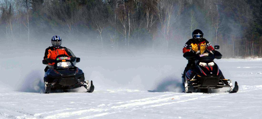 Snowmobiling - Discover Wisconsin's beautiful cities, towns and beautiful landscapes.  Wisconsin is for adventure!  From its lush forests and rolling hills to magnificent beaches - Wisconsin is a Vacation and Adventure Destination you will enjoy.  See America - See Wisconsin -a USA Travel Guide Destination!