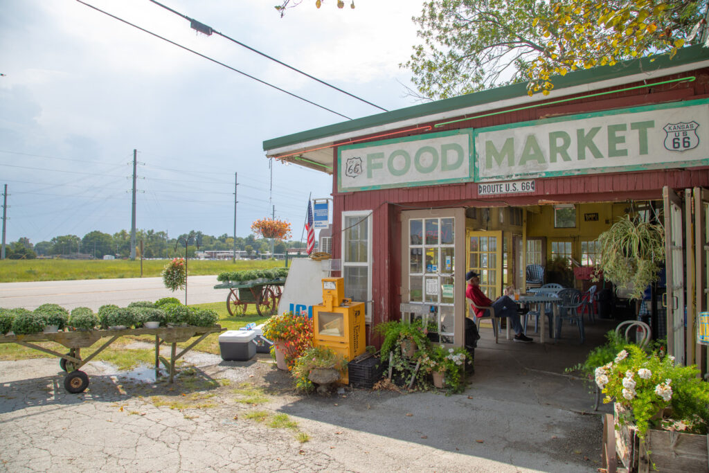 Lush greenery outside Nelson’s Old Riverton Store in Riverton, Kansas