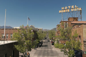 The bright yellow rooftop sign at Hotel Monte Vista in Flagstaff, Arizona