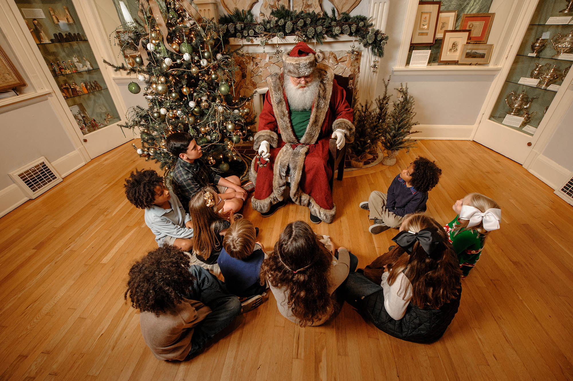 Visiting with Santa Claus at Burritt on the Mountain’s Candlelight Christmas event in Huntsville, Alabama.