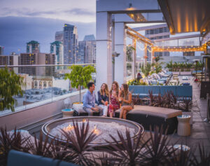 Enjoying drinks on a rooftop bar in San Diego, California