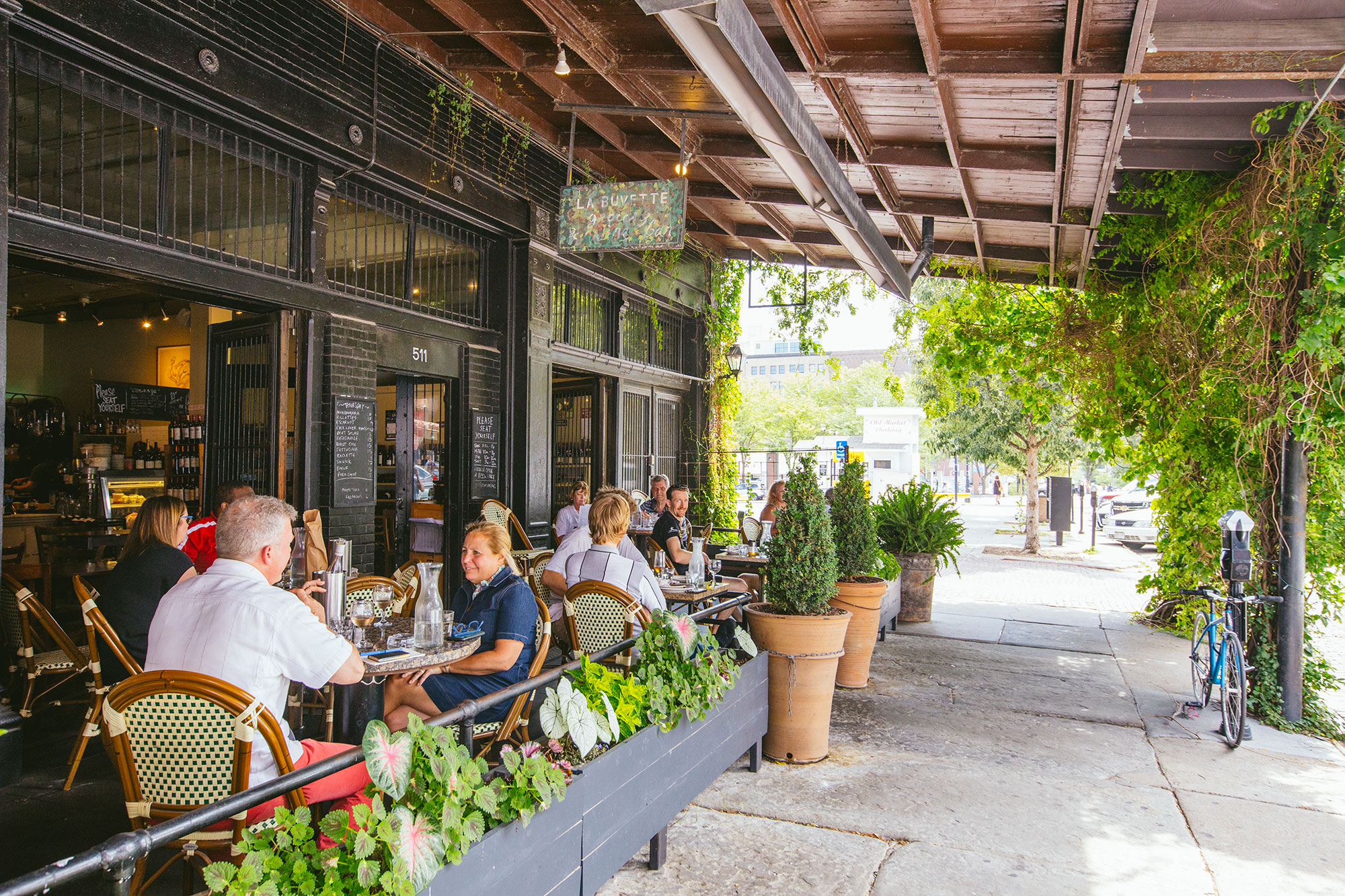 Visitors on the patio at La Buvette restaurant in Omaha, Nebraska