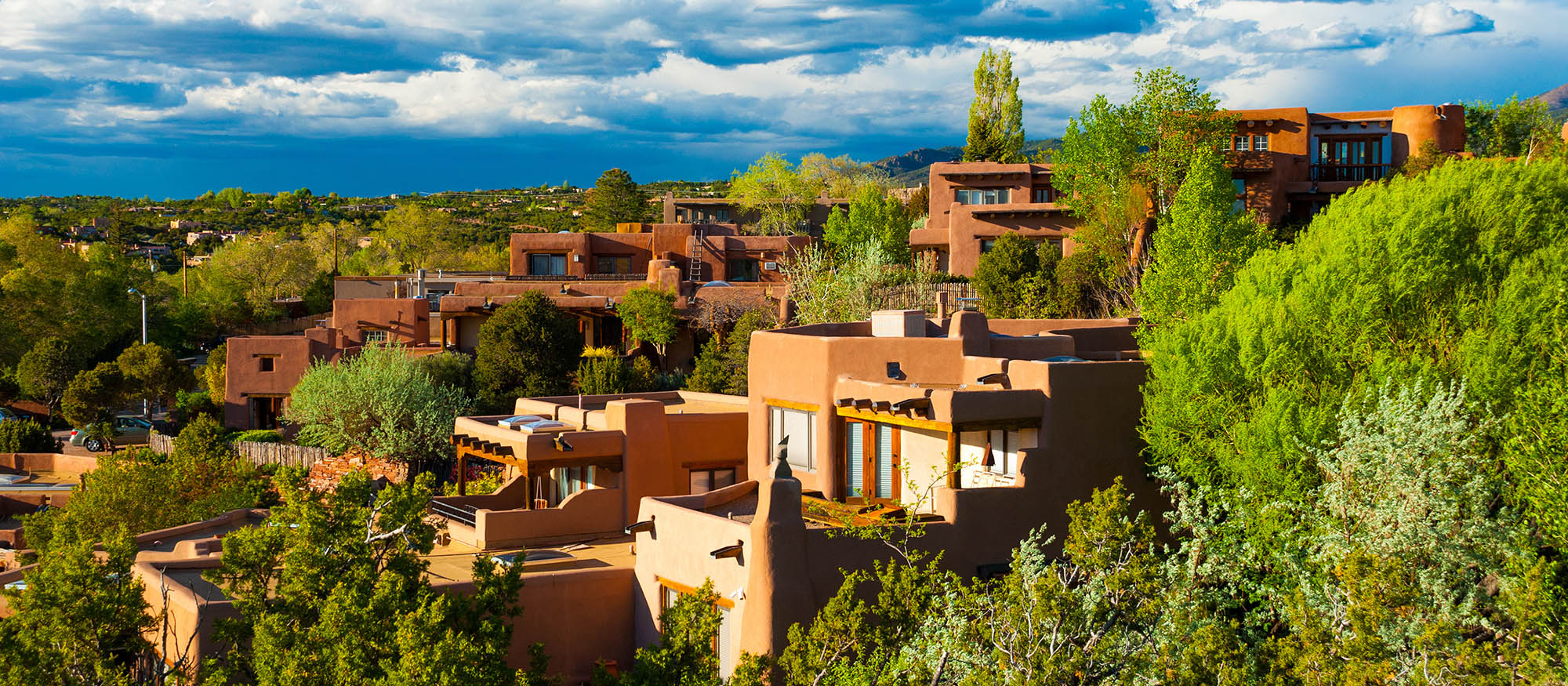 Hillside houses with traditional Pueblo architecture in Santa Fe, New Mexico