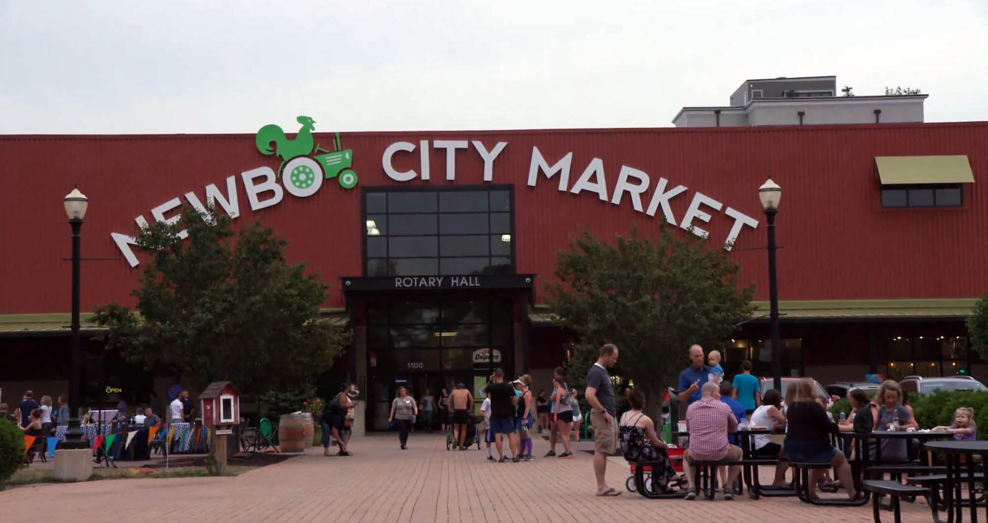 Shoppers outside NewBo City Market in Cedar Rapids, Iowa