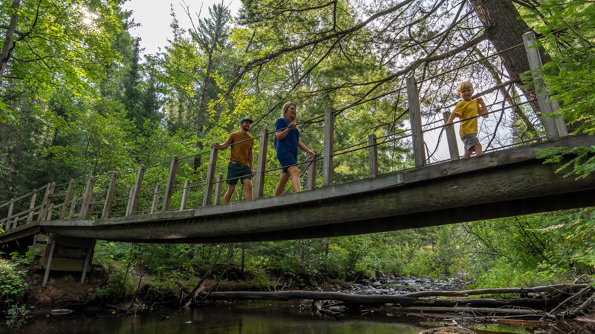 Family walking along the Songbird Trail near Marquette, Michigan