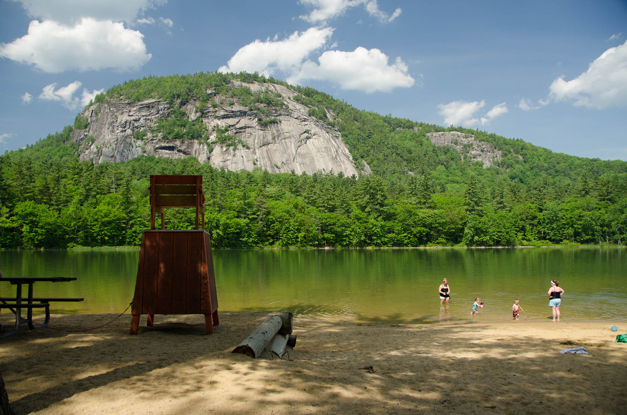 Family with kids enjoying summer on Echo Lake in New Hampshire’s White Mountains.