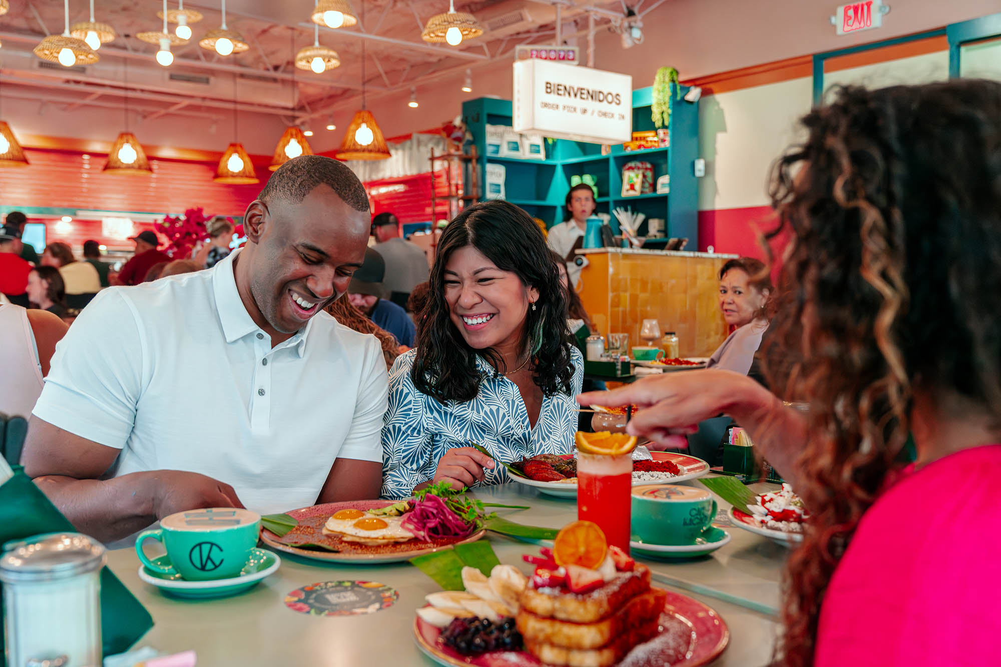 A group enjoys a meal at Cafe Kacao in Oklahoma City, Oklahoma

