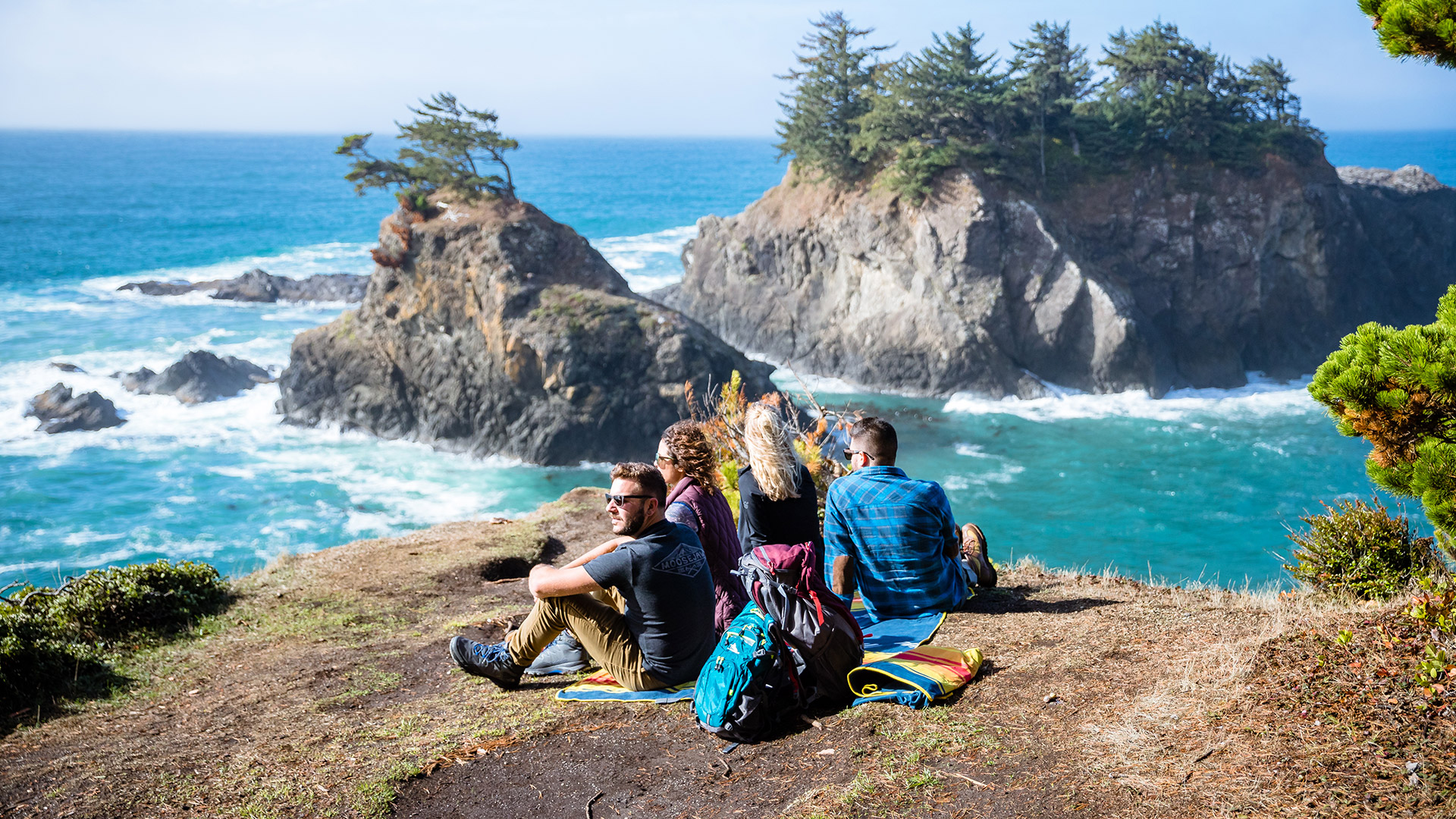 Hikers taking in views of the Pacific Ocean along Oregon’s Samual H. Boardman State Scenic Corridor