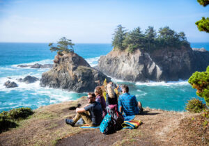 Hikers taking in views of the Pacific Ocean along Oregon’s Samual H. Boardman State Scenic Corridor