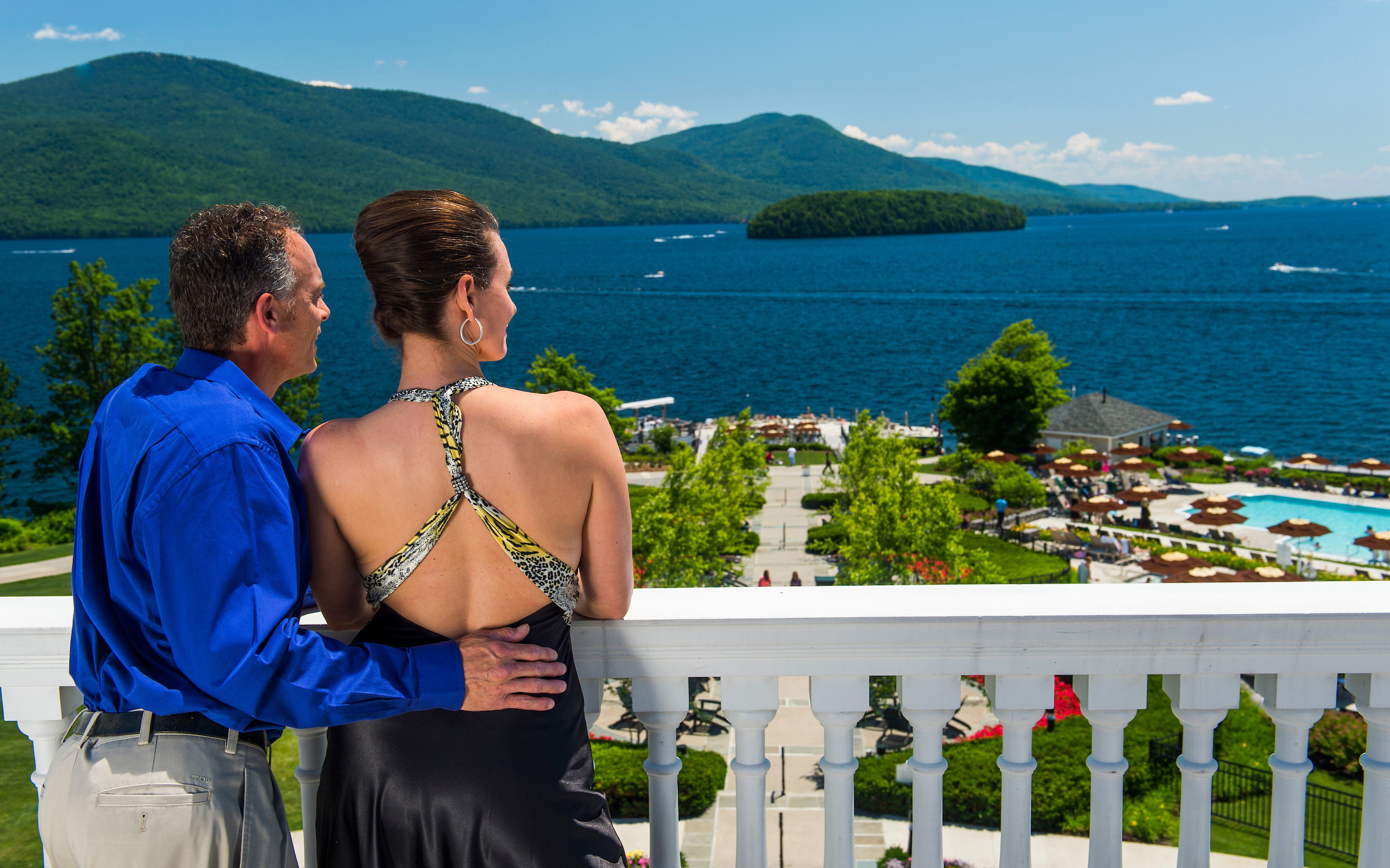 Couple overlooking Lake George from The Sagamore Resort in Hadley, New York