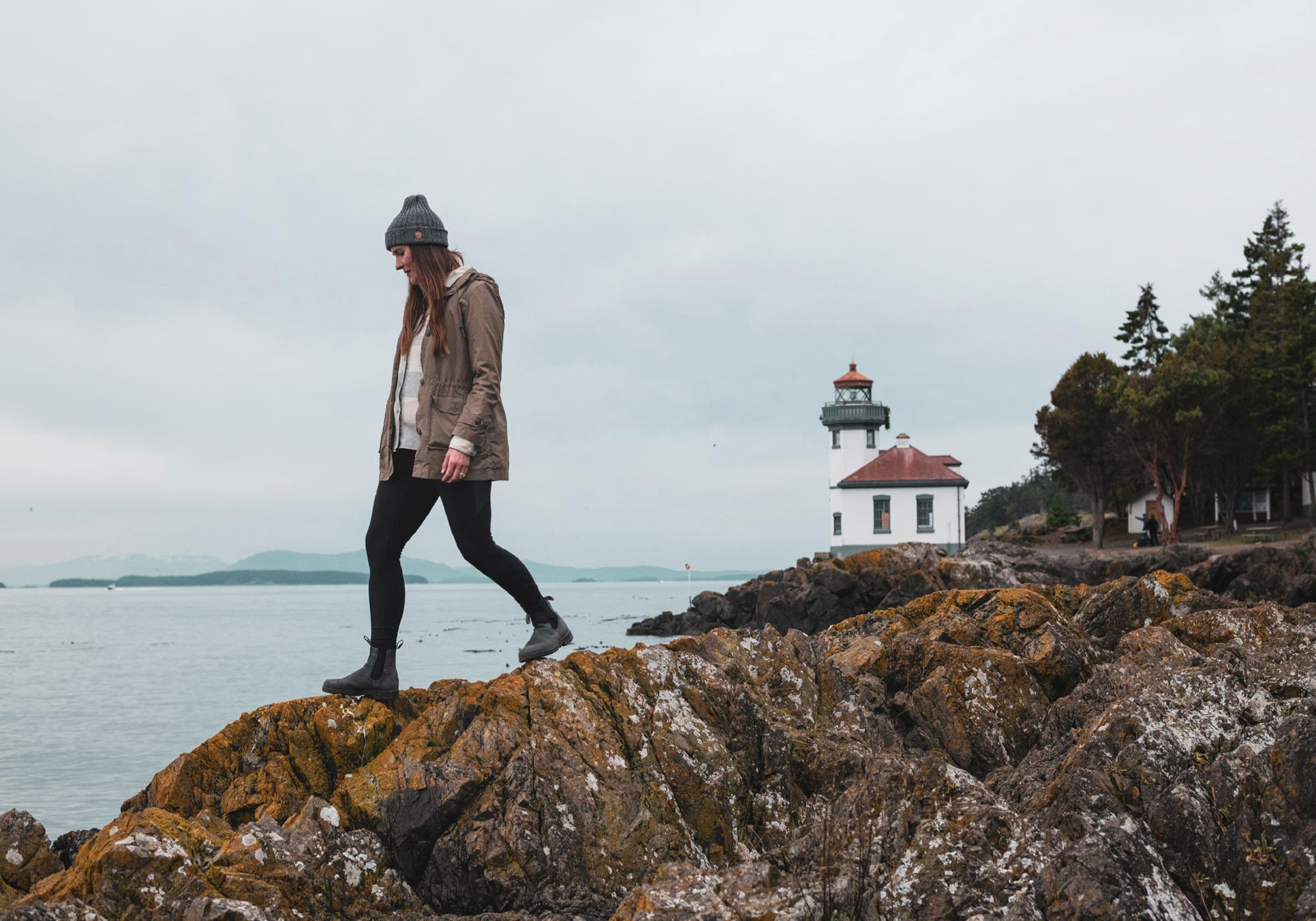 Visitor at the Lime Kiln Lighthouse at Washington’s Lime Kiln Point State Park