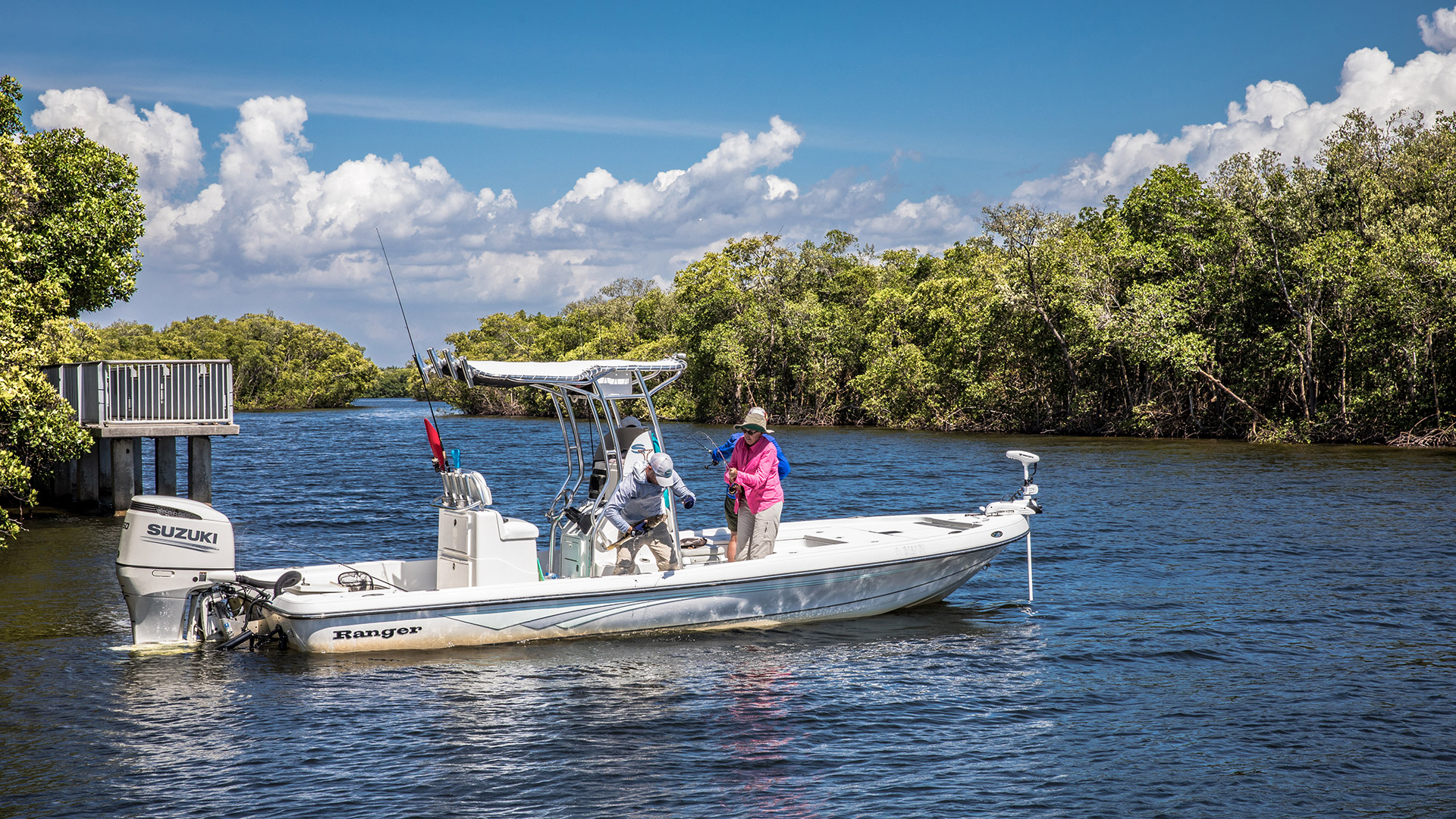 Reeling in a fish on a charter fishing trip in Charlotte County, Florida