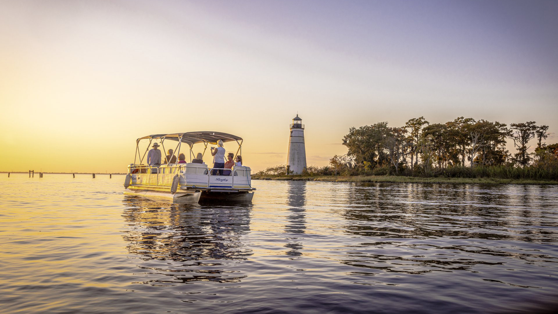 Pontoon boat tour near Madisonville Lighthouse in St. Tammany Parish, Louisiana