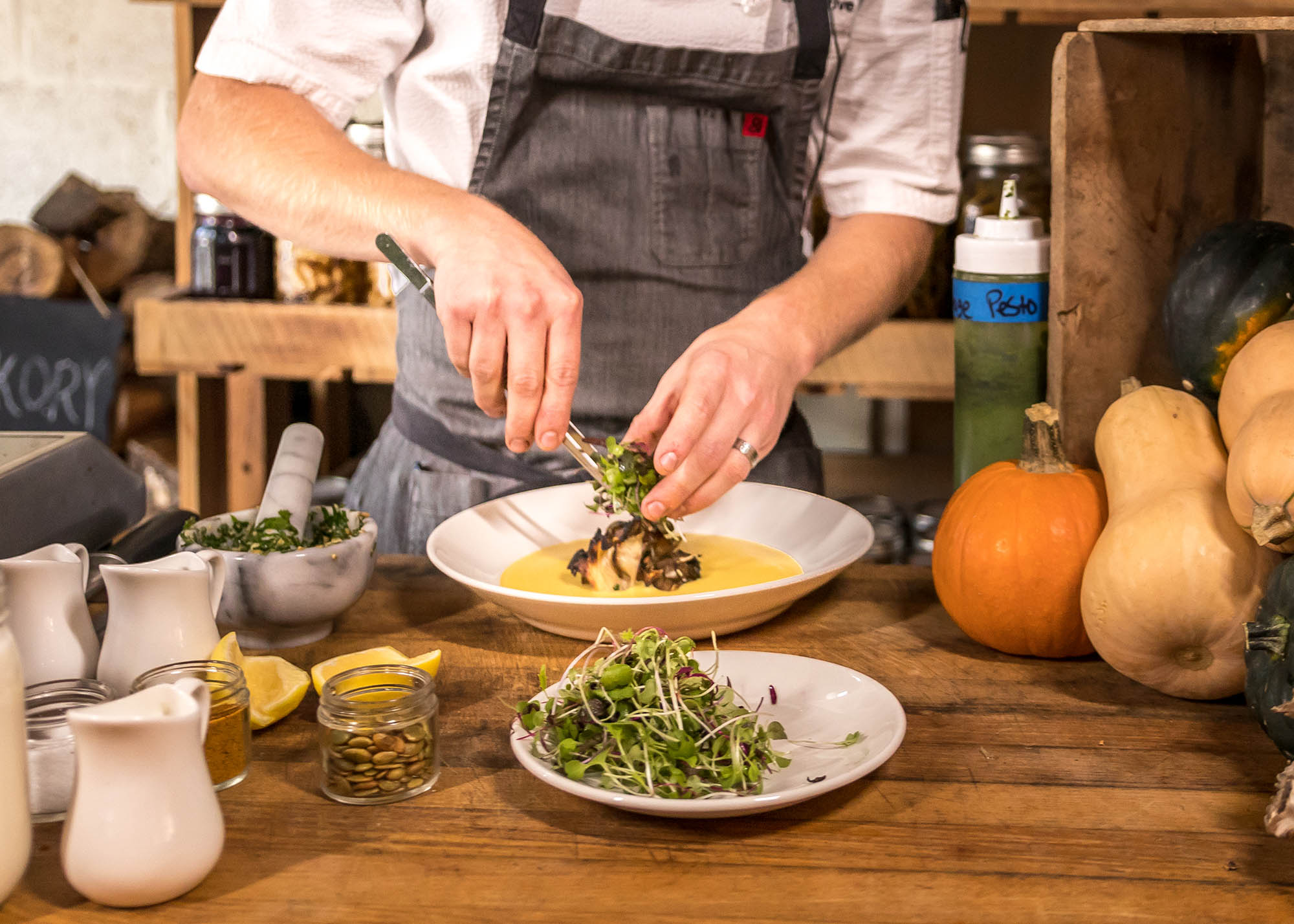 A chef plating a meal in Hershey and Harrisburg, Pennsylvania. Credit: Jason Brown
