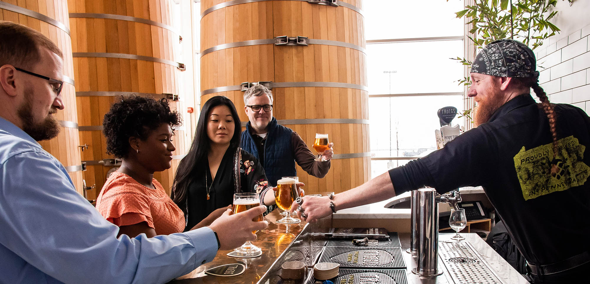 Enjoying craft beer at Tröegs Independent Brewing in Hershey, Pennsylvania. Credit: Visit Hershey & Harrisburg
