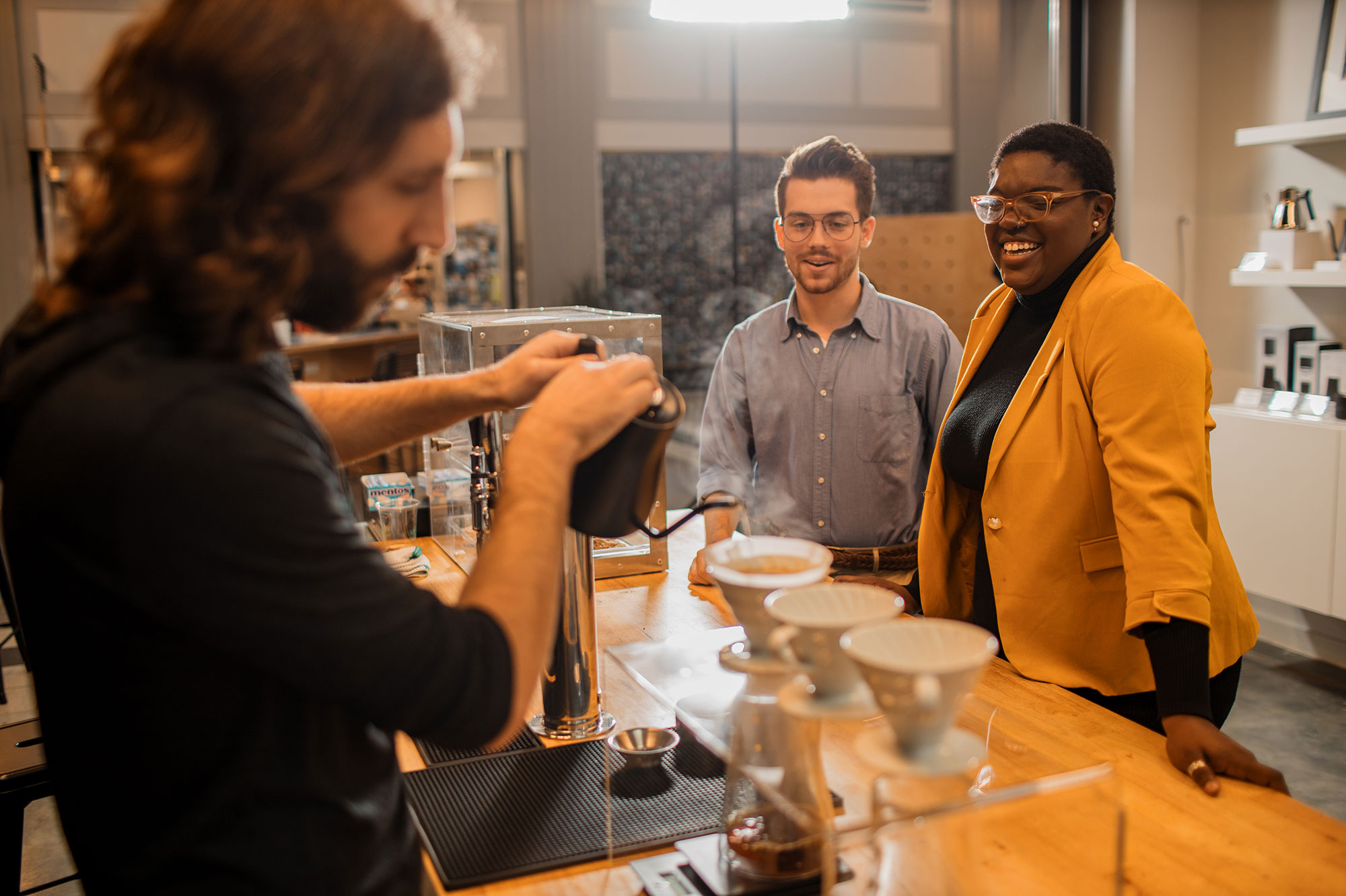 Customers at a coffeeshop in Selden Market in Norfolk, Virginia