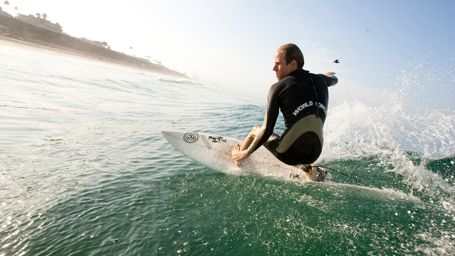 Surfing in Carlsbad Beach, California