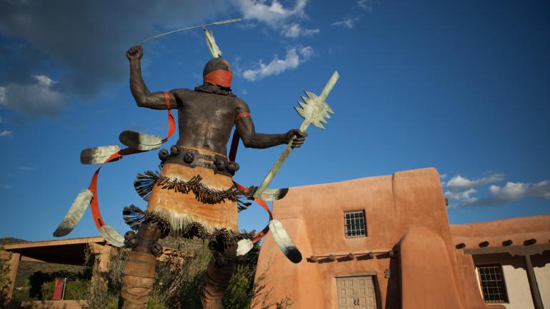 The Apache Mountain Spirit Dancer sculpture at the Museum of Indian Arts & Culture in Santa Fe