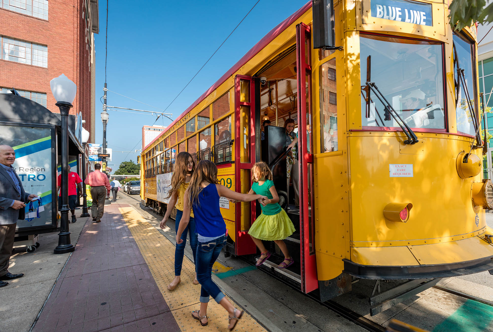 Getting off the Rock Region Metro Streetcar in downtown Little Rock, Arkansas
