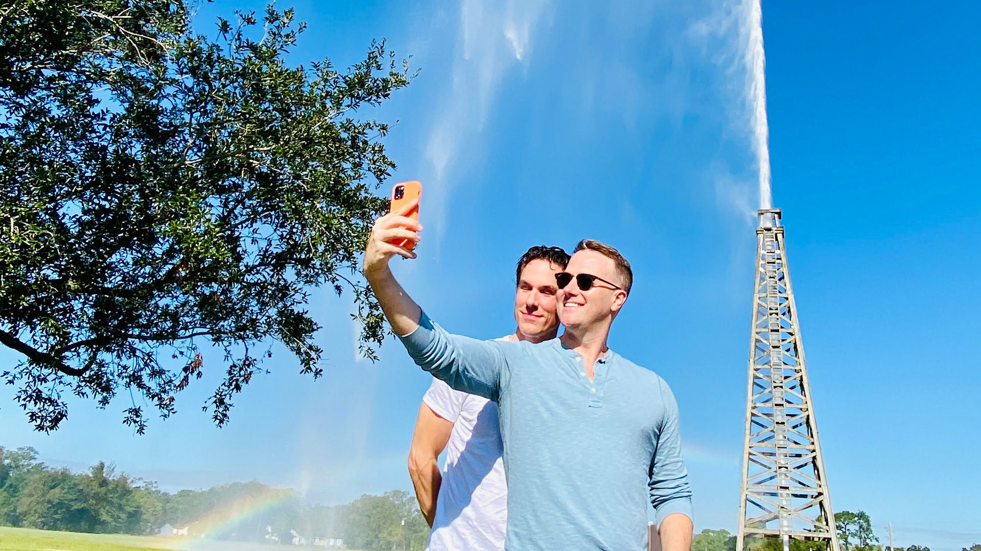 Posing in front of the replica oil rig at Spindletop-Gladys City Boomtown Museum in Beaumont, Texas