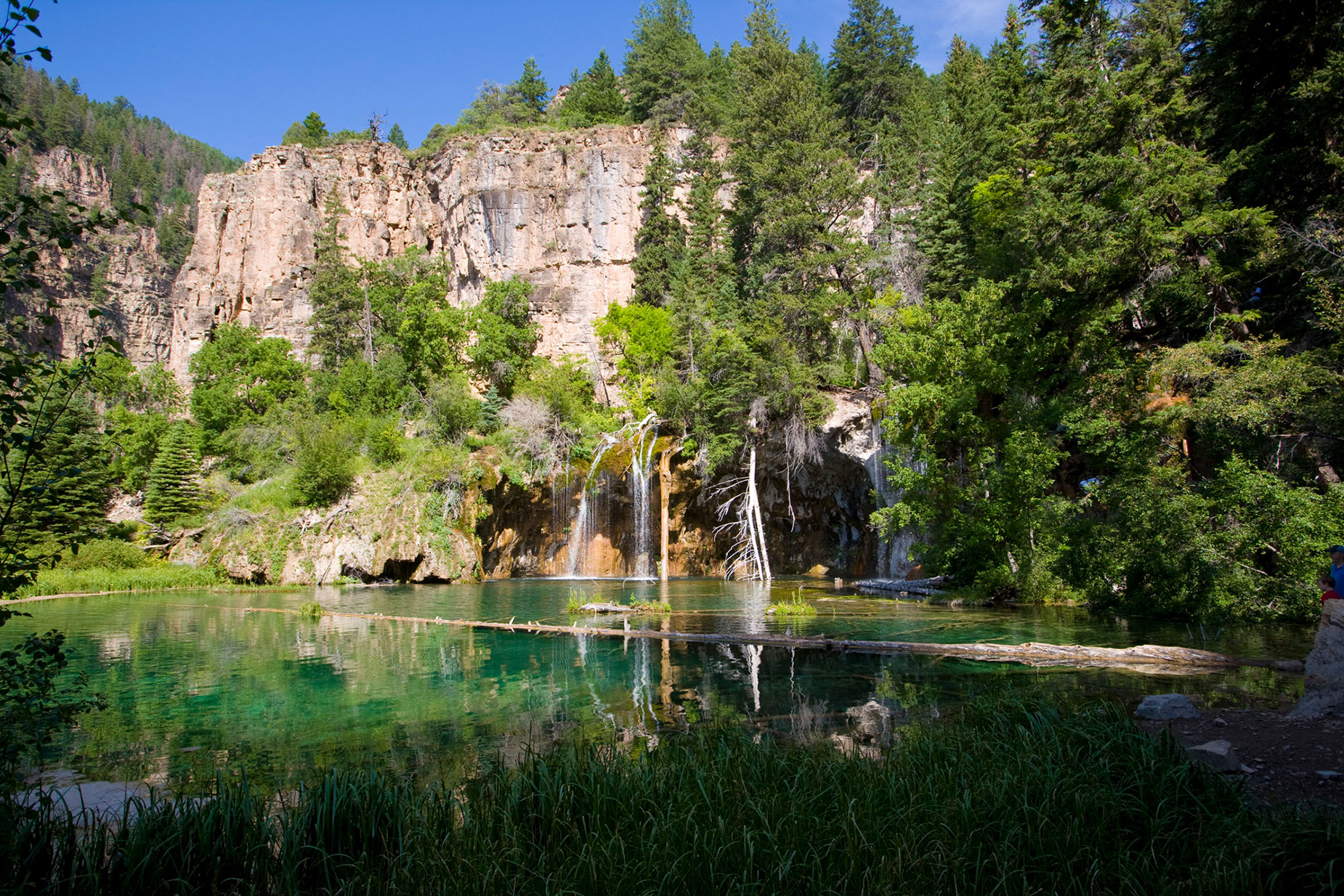 Waterfalls cascading over cliffs at Hanging Lake near Glenwood Springs, Colorado