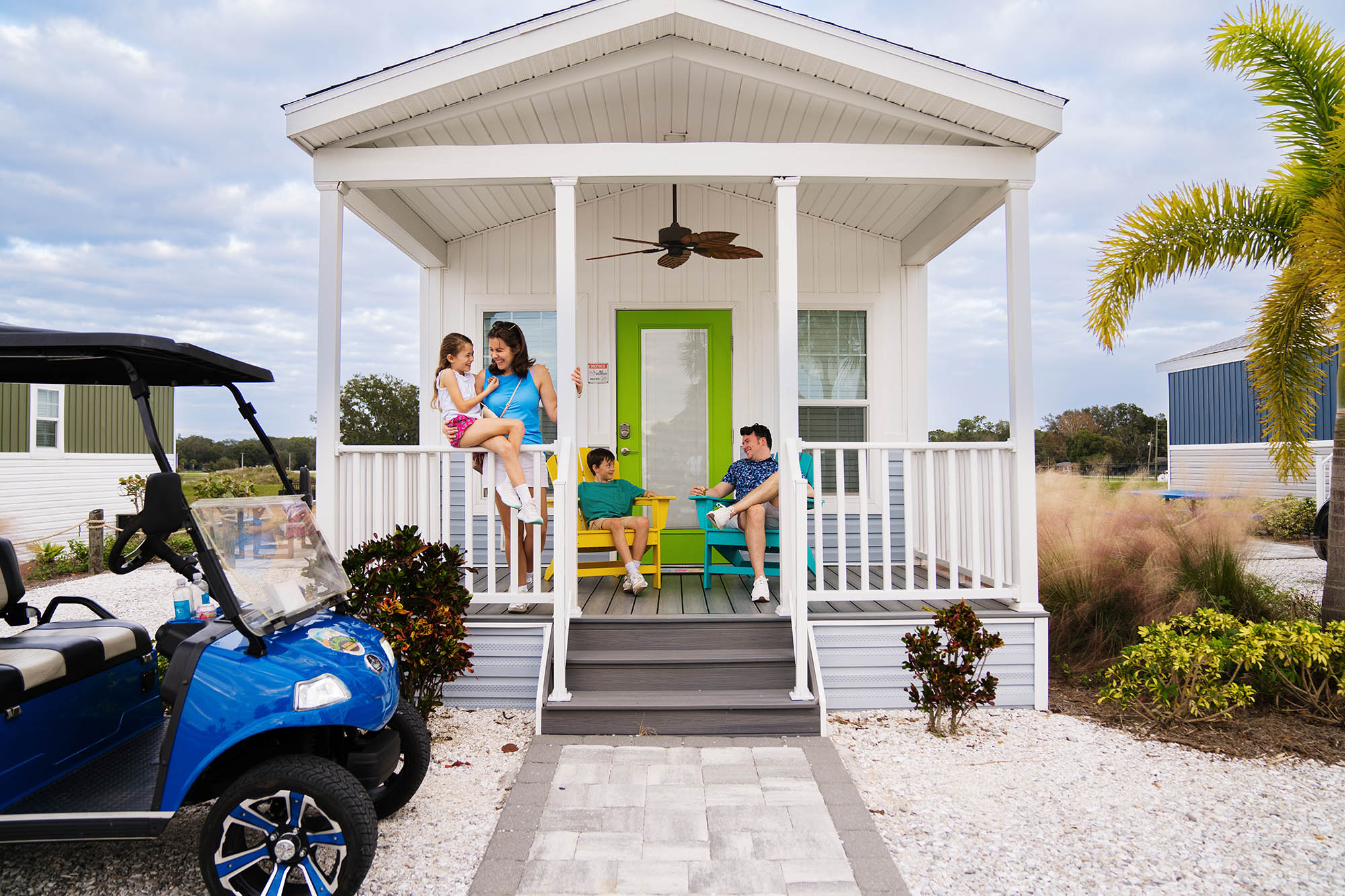 A family staying at a Cabana Cabin at the Margaritaville RV Resort in Auburndale, Central Florida.