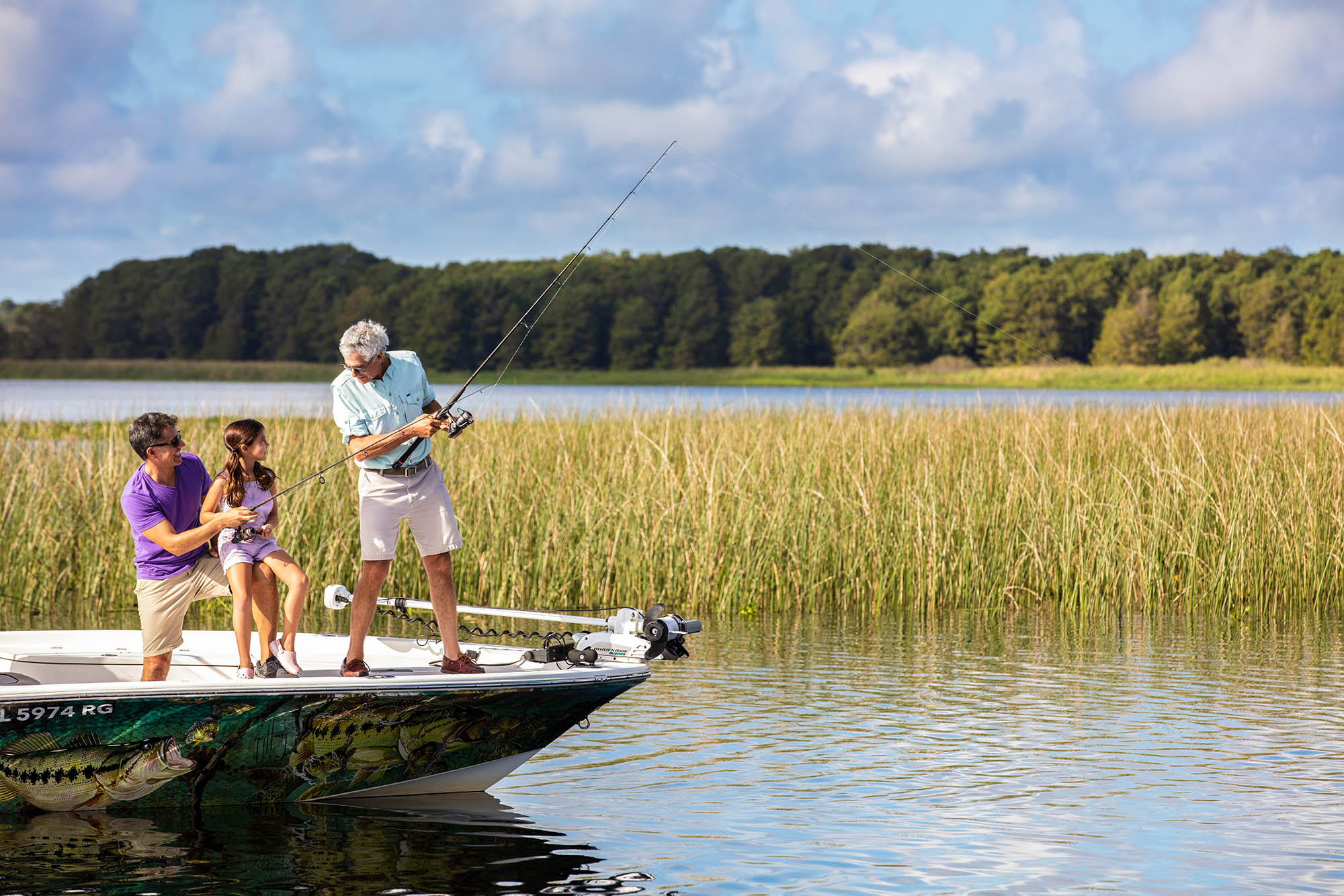 A family fishing on a lake in Polk County, Central Florida