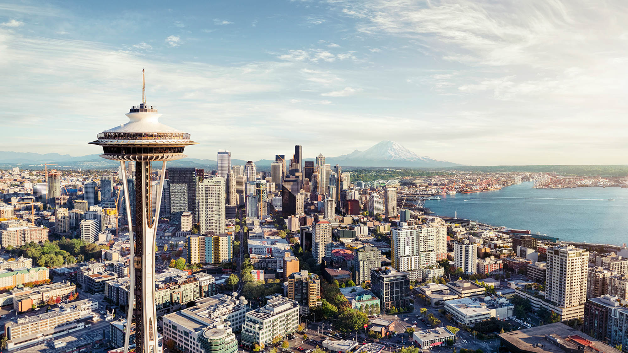View of the Space Needle with Mount Rainier in the distance in Seattle, Washington