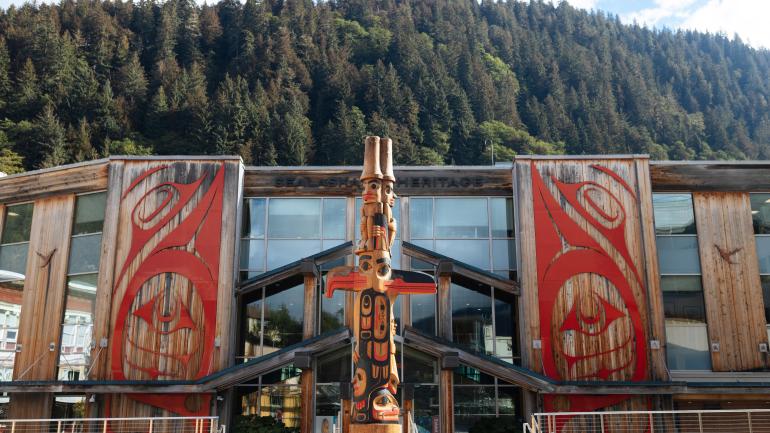 Art installations by contemporary Haida, Tsimshian and Tlingit artists decorate the exterior of the Sealaska Heritage Institute; Credit: Travel Alaska