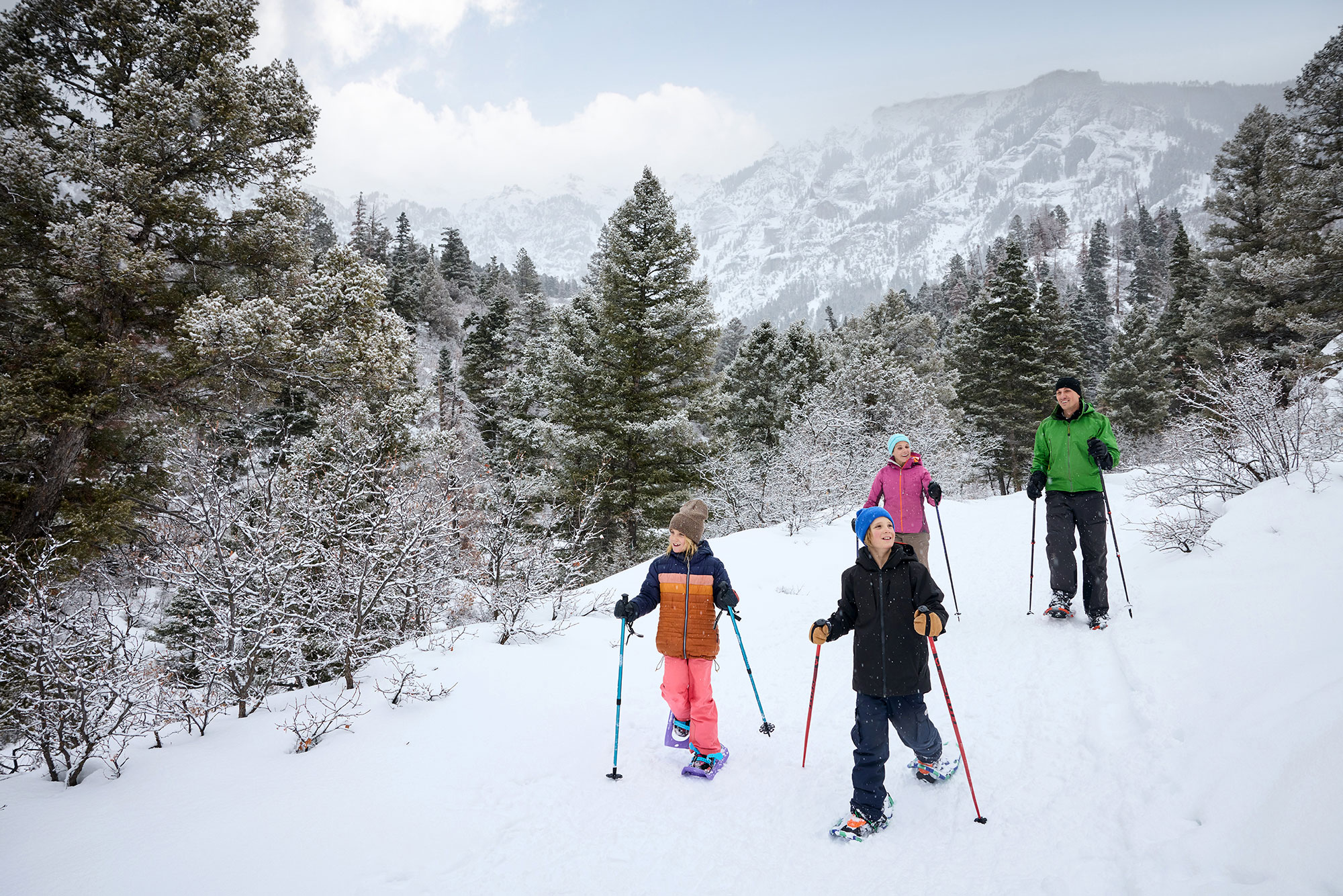 Family snowshoeing along Amphitheater Road in Ouray, Colorado; Credit: Visit Ouray
