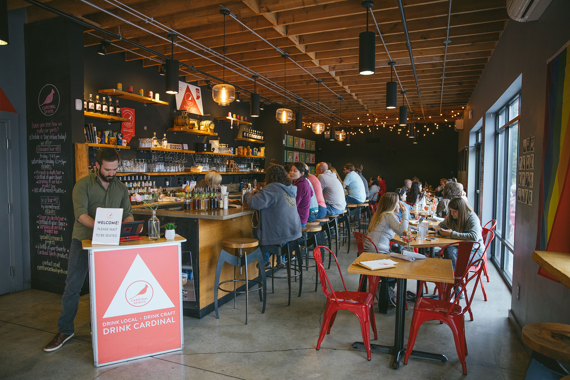 Visitors to Cardinal Spirits Craft Distillery in Bloomington, Indiana