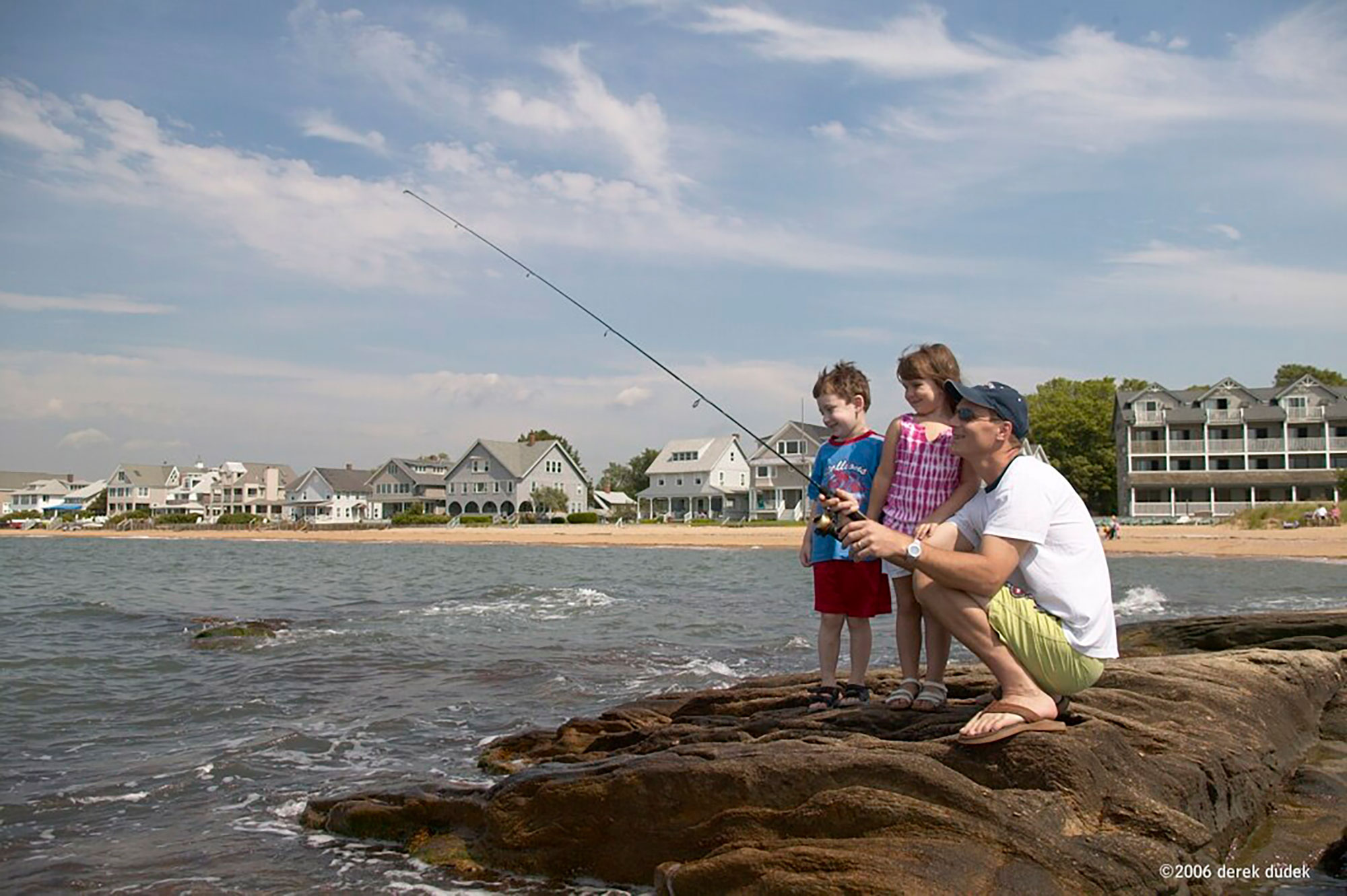 Family fishing in a cove near New Haven, Connecticut; Credit: Derek Dudek