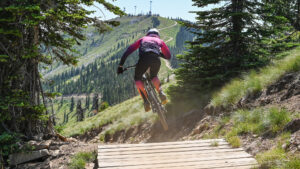 Mountain biker on a trail at Schweitzer Mountain Resort in Sandpoint, Idaho; Credit: Schweitzer
