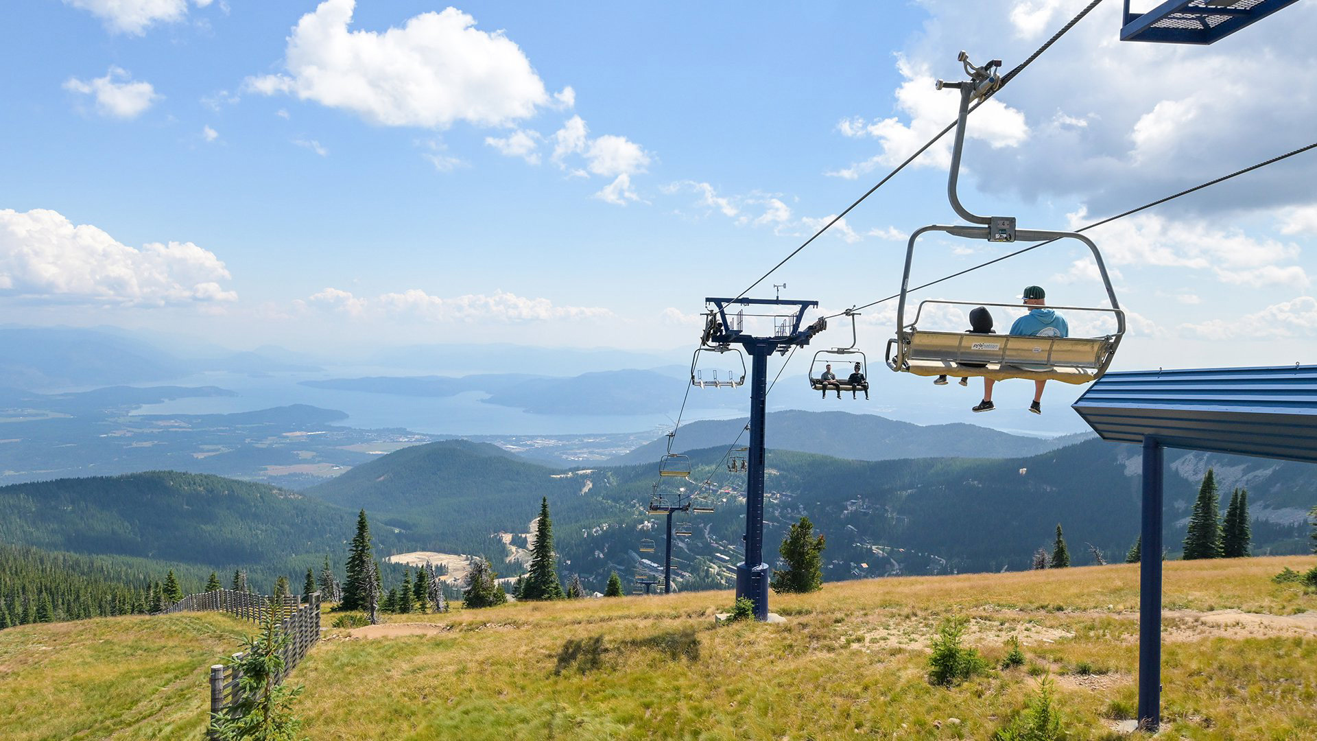 Scenic summer lift ride at Schweitzer Mountain Resort in Sandpoint, Idaho; Credit: Schweitzer