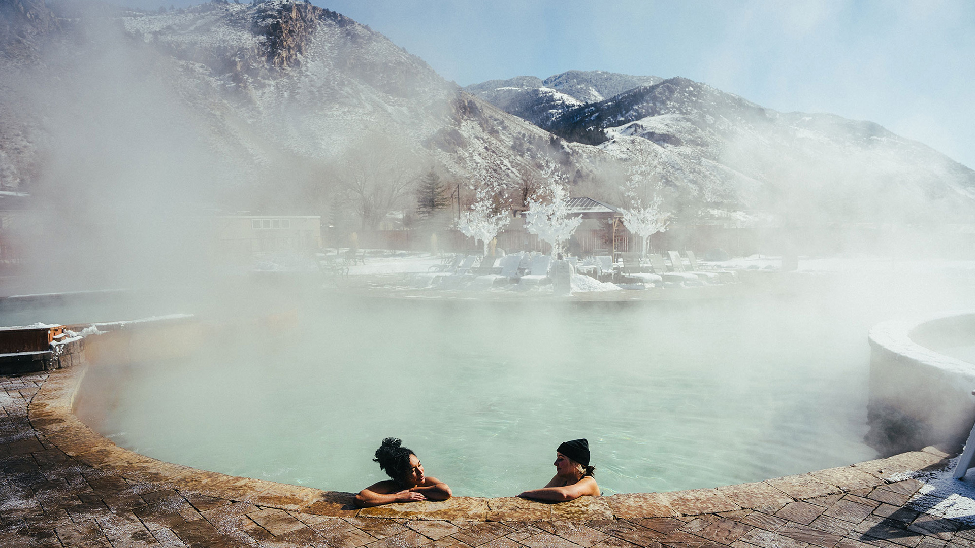 Visitors at Yellowstone Hot Springs in Gardiner, Montana; Credit: Sam Rouda