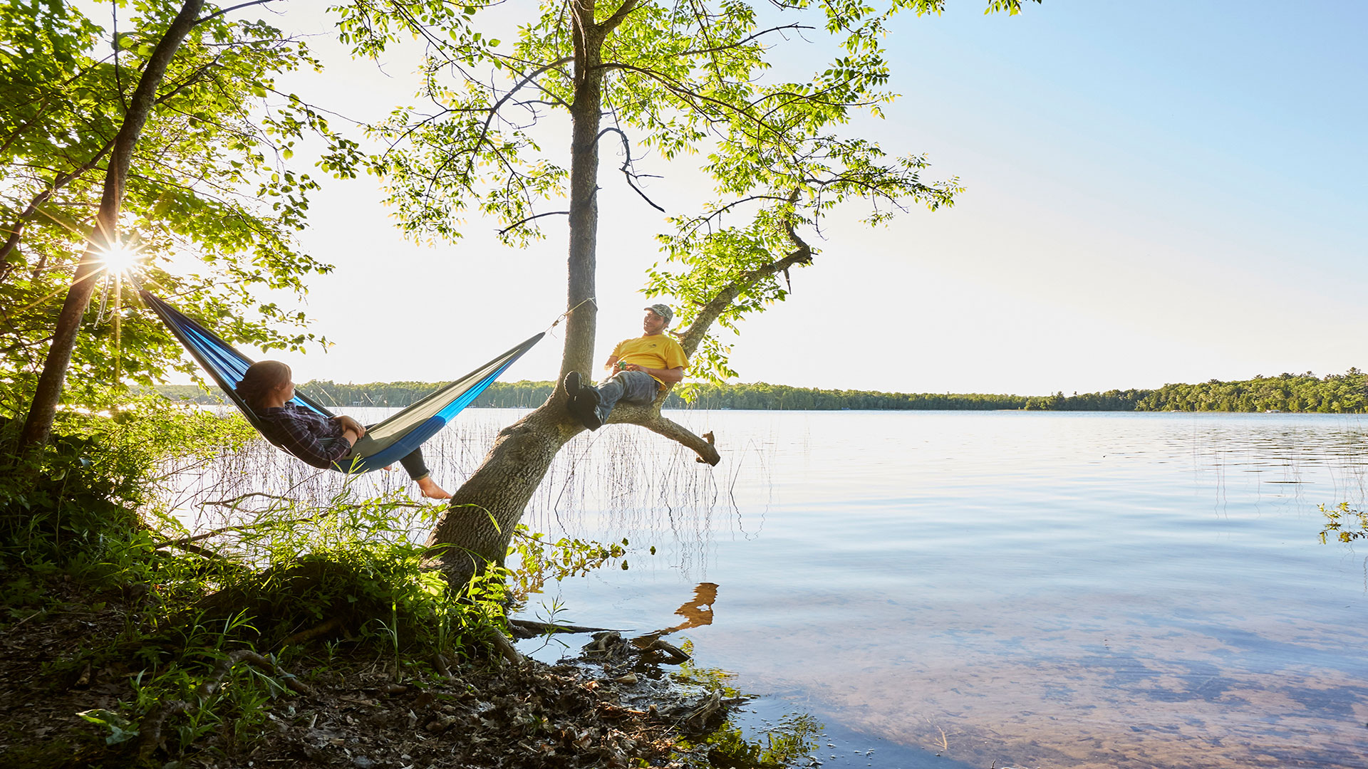 Visitors relaxing lakeside at Newport State Park in Door County, Wisconsin