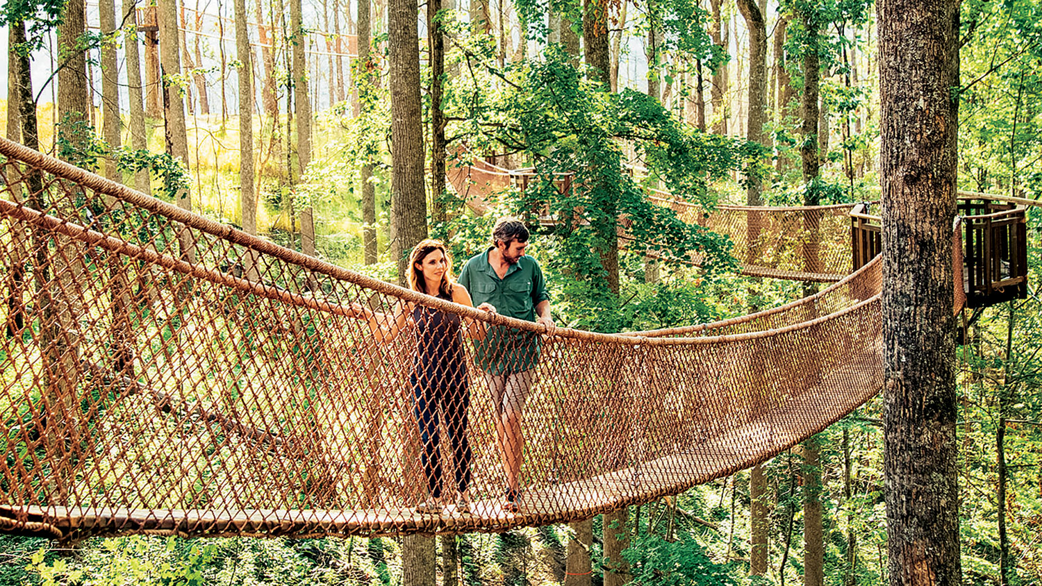 Crossing a treetop rope bridge at Anakeesta in Gatlinburg, Tennessee