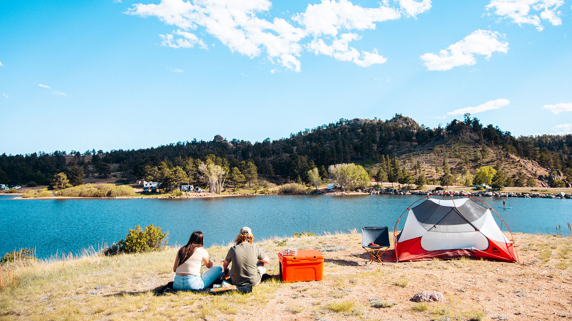 Campers overlooking a lake at Curt Gowdy State Park in Wyoming’s Laramie County
