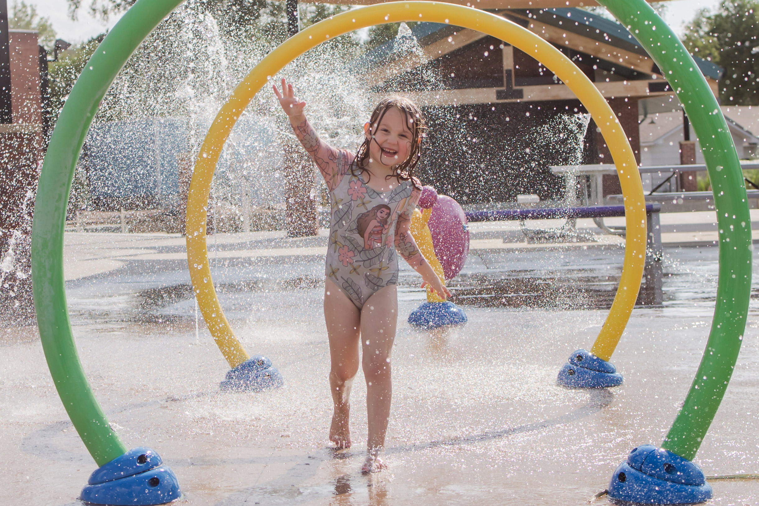 A child playing at Glenrock Town Square in Glenrock, Wyoming