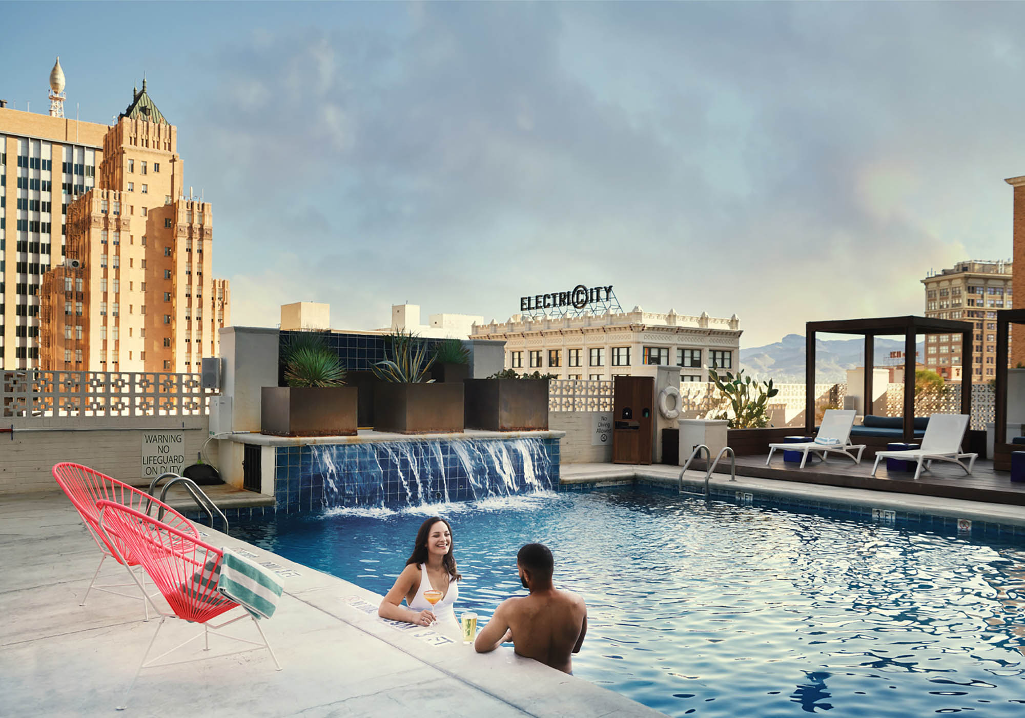 Swimming in a rooftop pool at the Hotel Indigo El Paso Downtown in El Paso, Texas; Credit: Visit El Paso
