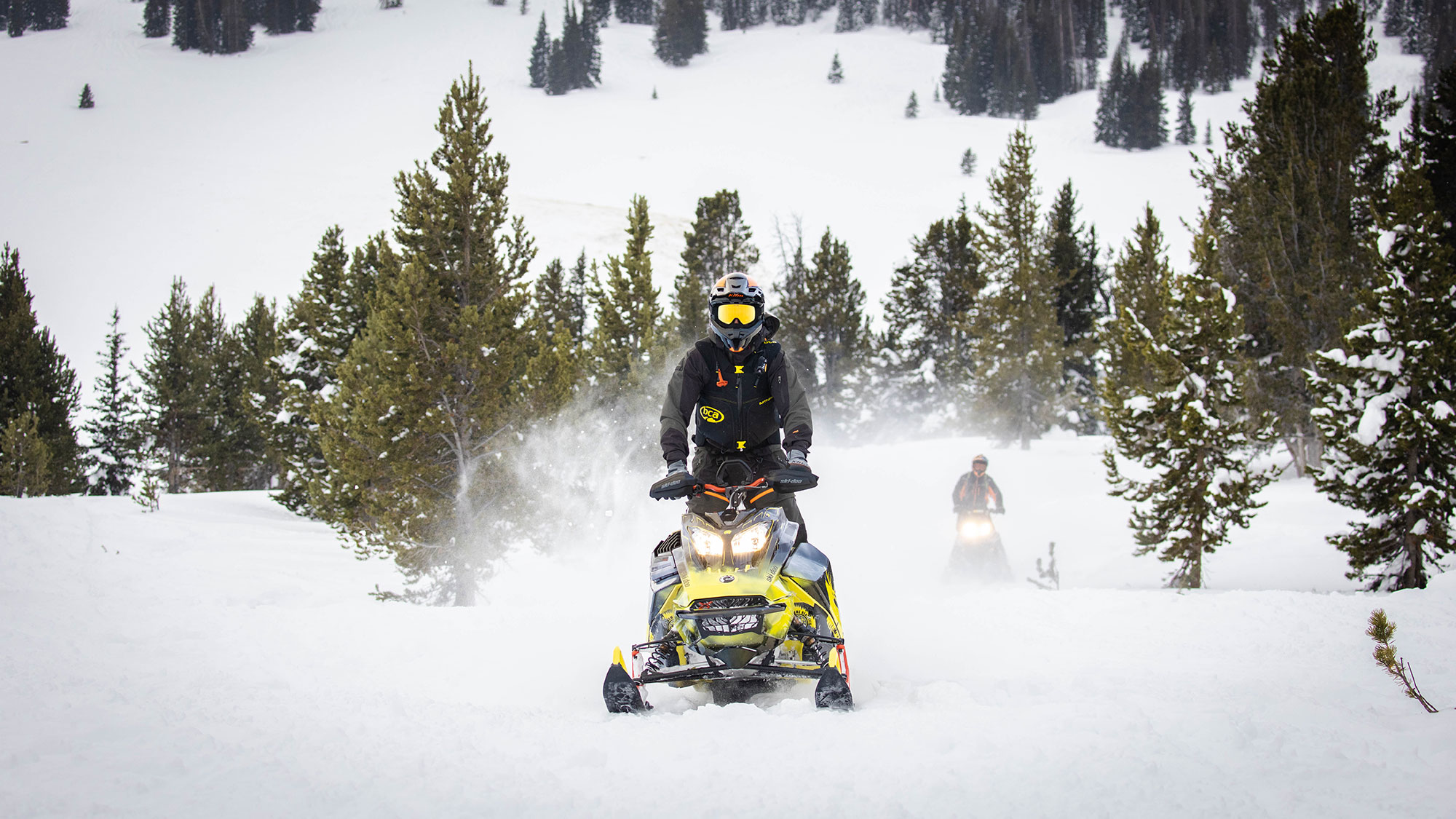 Snowmobilers in the Beartooth Mountains of Wyoming’s Park County