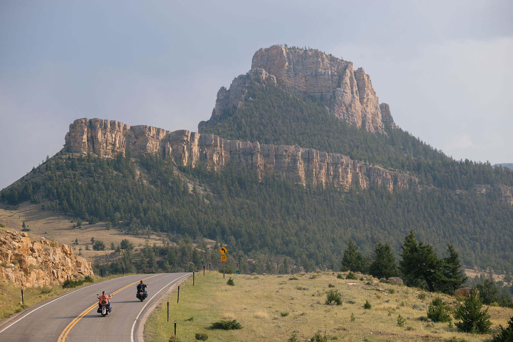 Motorcyclists on the Chief Joseph Scenic Byway in Wyoming’s Park County 