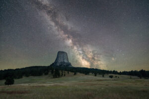 Night view of the Milky Way above Devils Tower National Monument in Devils Tower Country, Wyoming