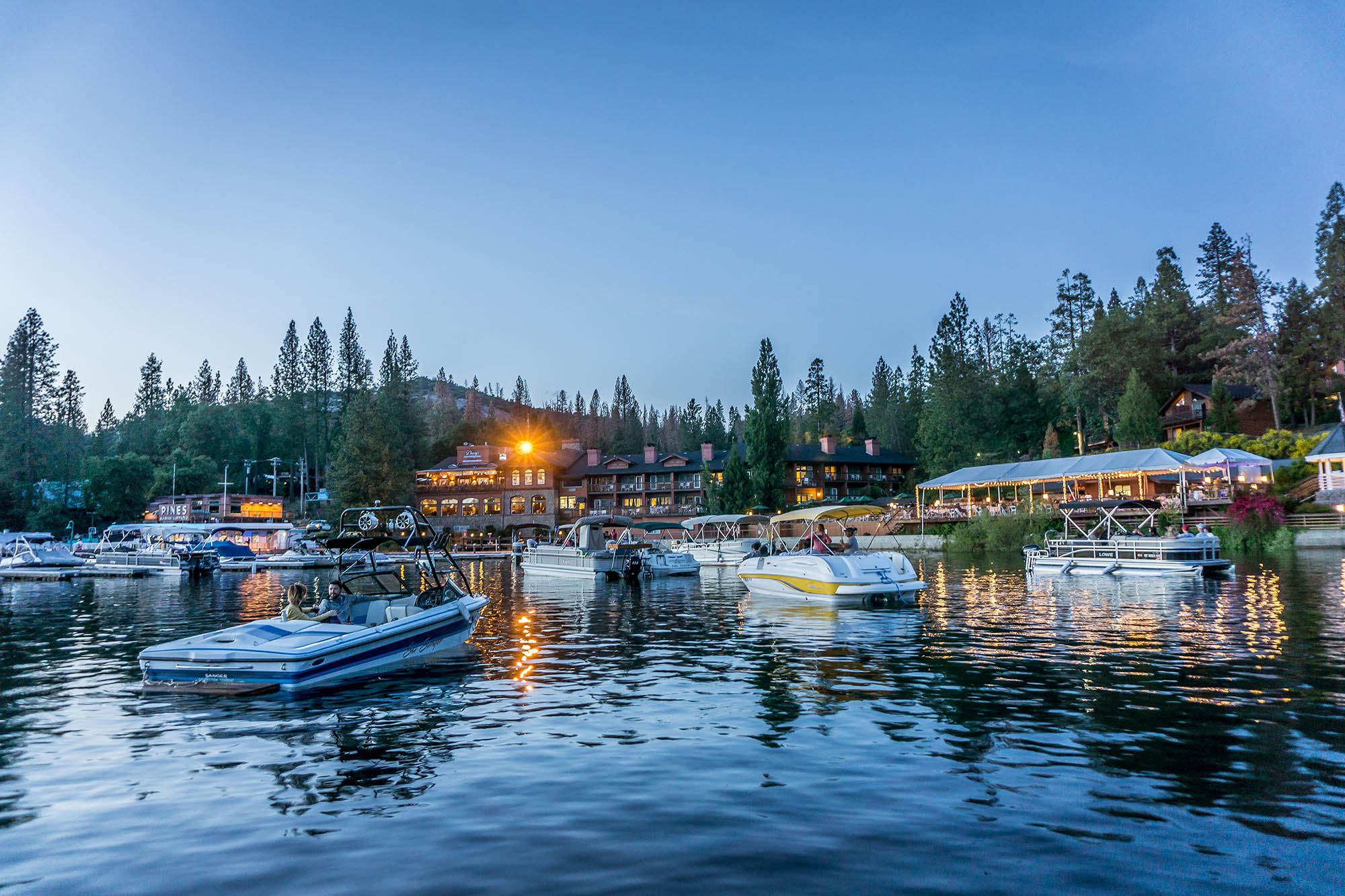 Boats on the water at Bass Lake Resort in Bass Lake, California
